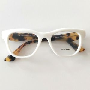 Prada 04QV Glasses. Ivory. 49-18-140